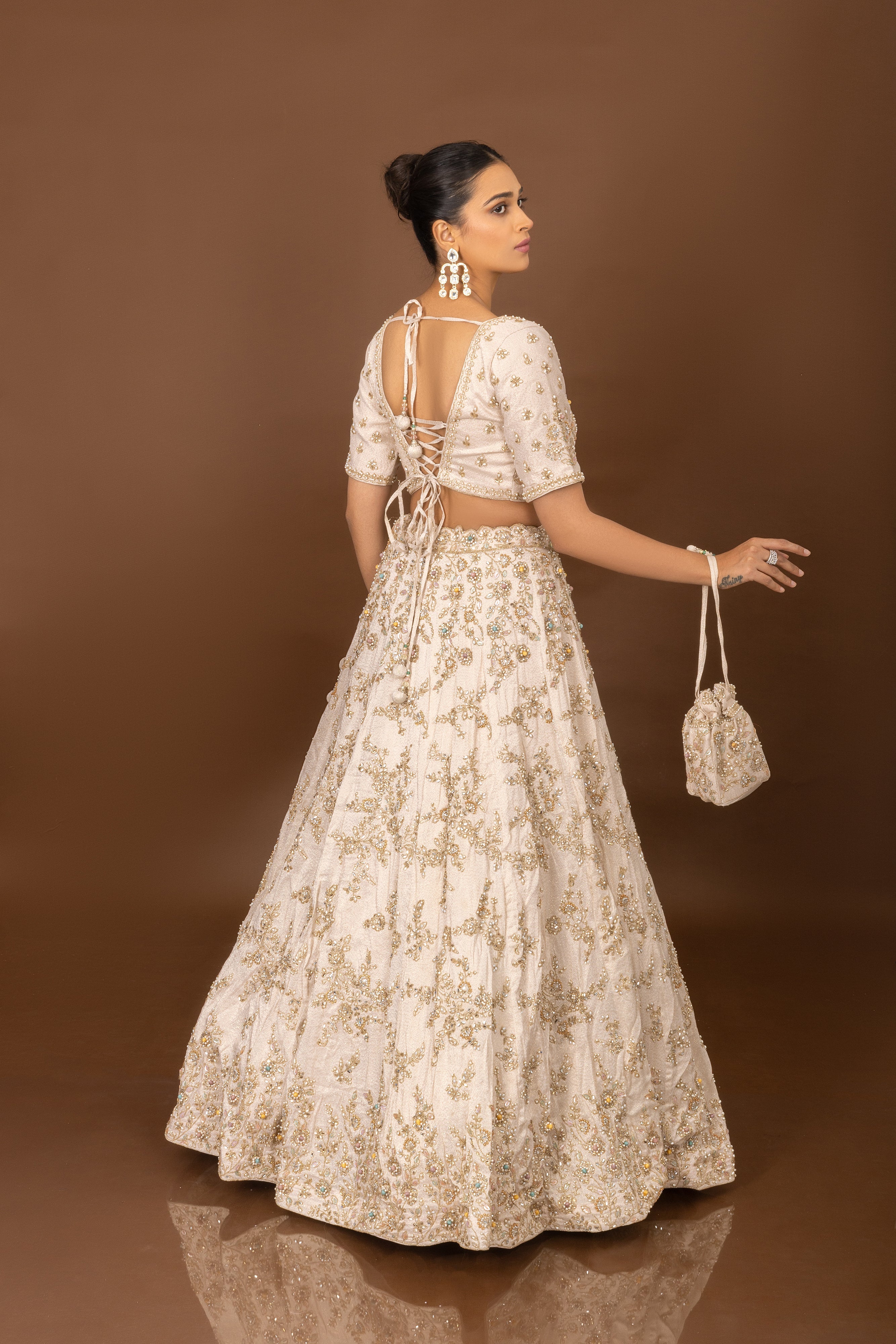 Divine Flair: Artisanal Off White Designer Lehenga Choli with Handwork