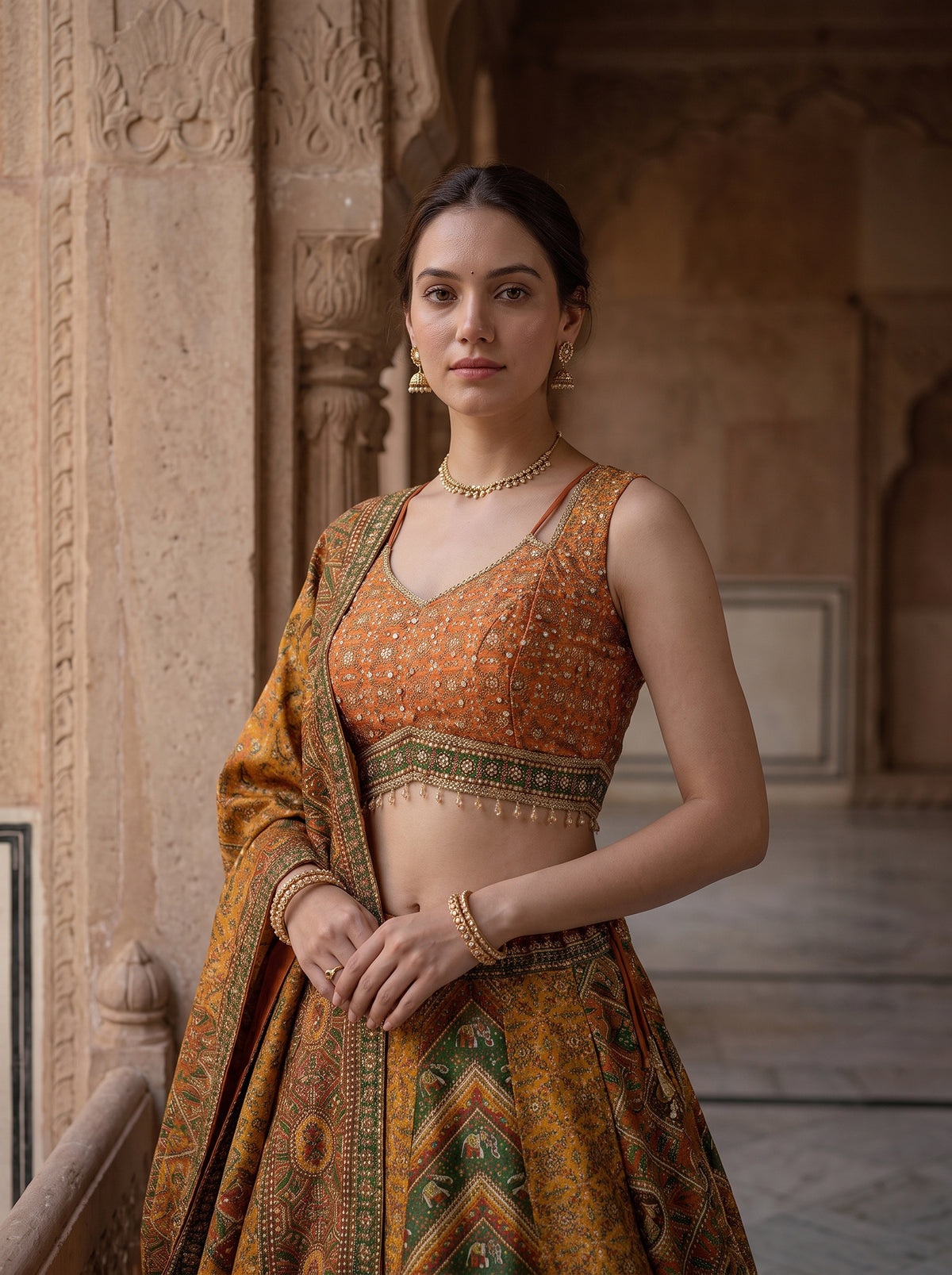 Radiant Heritage | Mustard & Rust Silk Patola Print Lehenga with Handwork Blouse | Palkhi Fashion