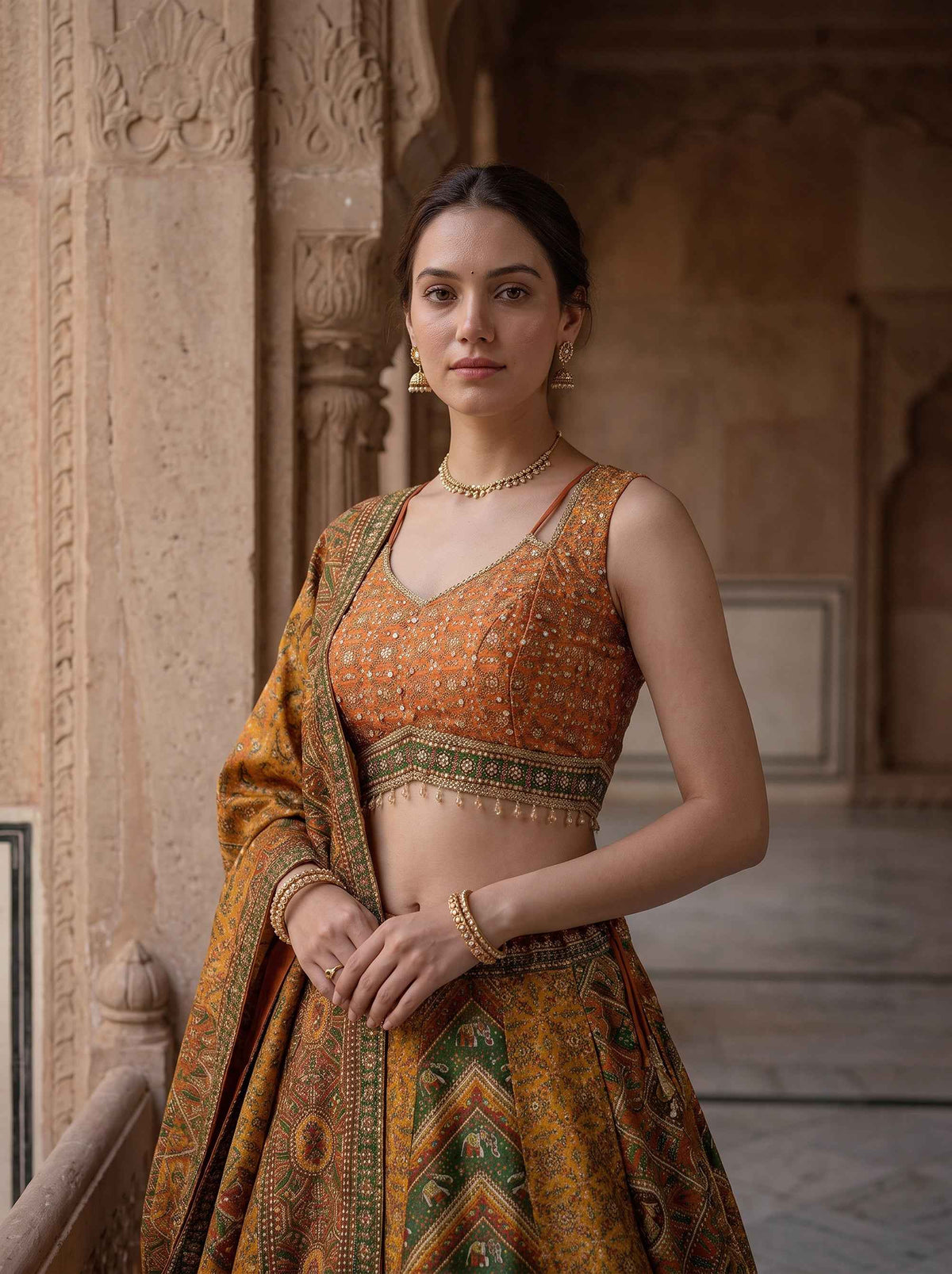Radiant Heritage | Mustard & Rust Silk Patola Print Lehenga with Handwork Blouse | Palkhi Fashion