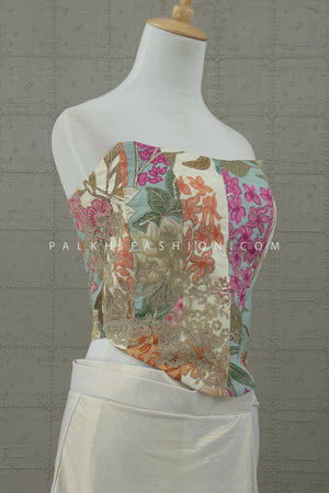 Enchanted Bloom: Ivory Pre - Draped Saree with Floral Embroidered Corset – Palkhi Fashion