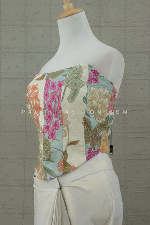 Enchanted Bloom: Ivory Pre - Draped Saree with Floral Embroidered Corset – Palkhi Fashion