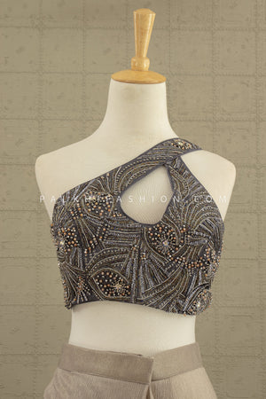 Luxe Mirage: Champagne Sculpted Saree with One - Shoulder Embellished Blouse