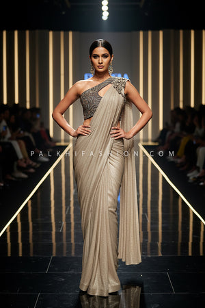 Luxe Mirage: Champagne Sculpted Saree with One - Shoulder Embellished Blouse