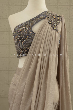 Luxe Mirage: Champagne Sculpted Saree with One - Shoulder Embellished Blouse