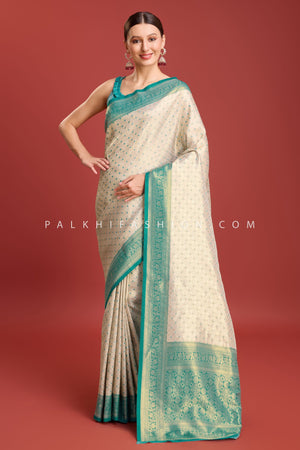 Off - White & Teal Green Kanjivaram Silk Saree with Elegant Weaving – Palkhi Fashion