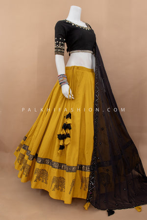 🐘 Regal Rhythm: Mustard & Black Navratri Chaniya Choli With Appealing Work