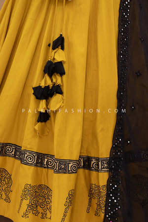 🐘 Regal Rhythm: Mustard & Black Navratri Chaniya Choli With Appealing Work