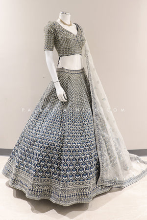 Royal Grandeur: Premium Teal Blue Pure Silk Bridal Lehenga Choli with Handwork