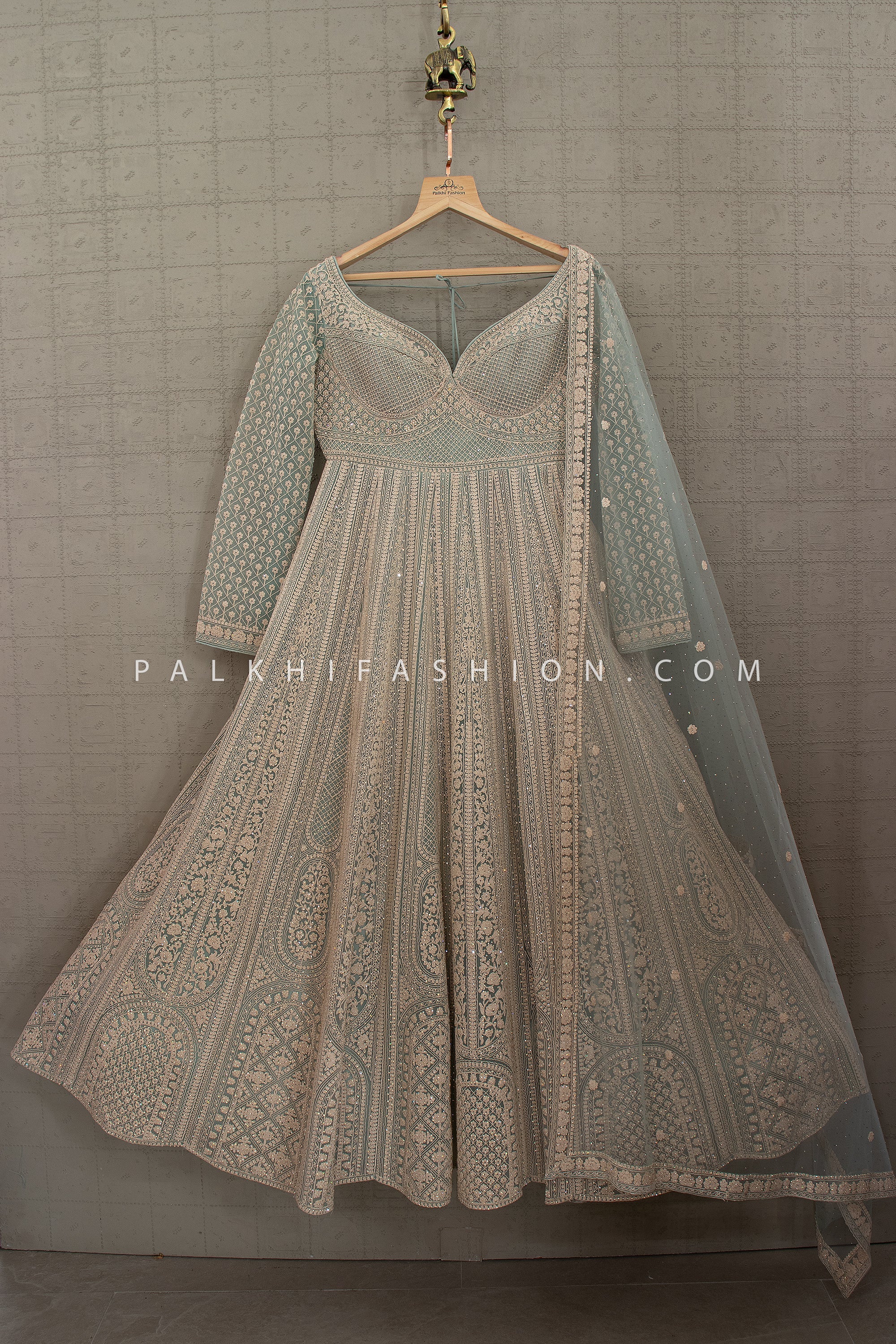 Royal Pastel Green Jaal Embroidered Designer Gown with Intricate Thread & Stone Work