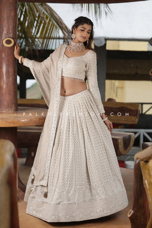 Magnetic Lakhanvi Work Designer Lehenga Choli In Off-white Color - Palkhi Fashion