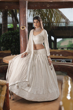 Magnetic Lakhanvi Work Designer Lehenga Choli In Off-white Color - Palkhi Fashion