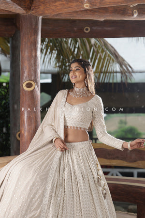 Magnetic Lakhanvi Work Designer Lehenga Choli In Off-white Color - Palkhi Fashion