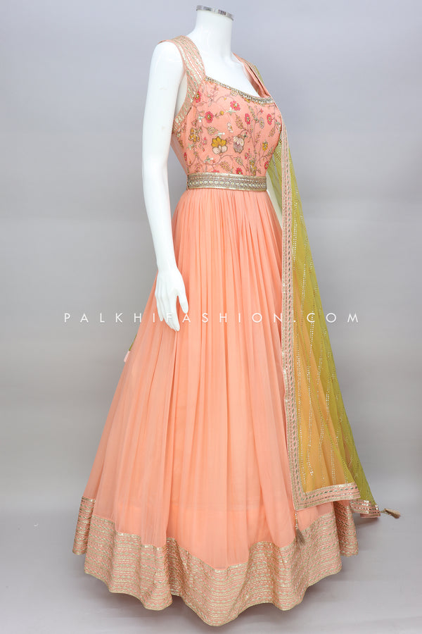 Captivate in a Stunning Peach Indian Outfit with Exquisite Detailing