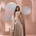 Champagne Radiance | Champagne Silver Pleated Georgette Cape Lehenga with Cutdana Chevron Work | Palkhi Fashion