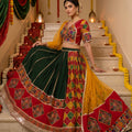 Vibrant Festive Radiance | Green and Red Bandhej Chaniya Choli with Mirror Work | Palkhi Fashion