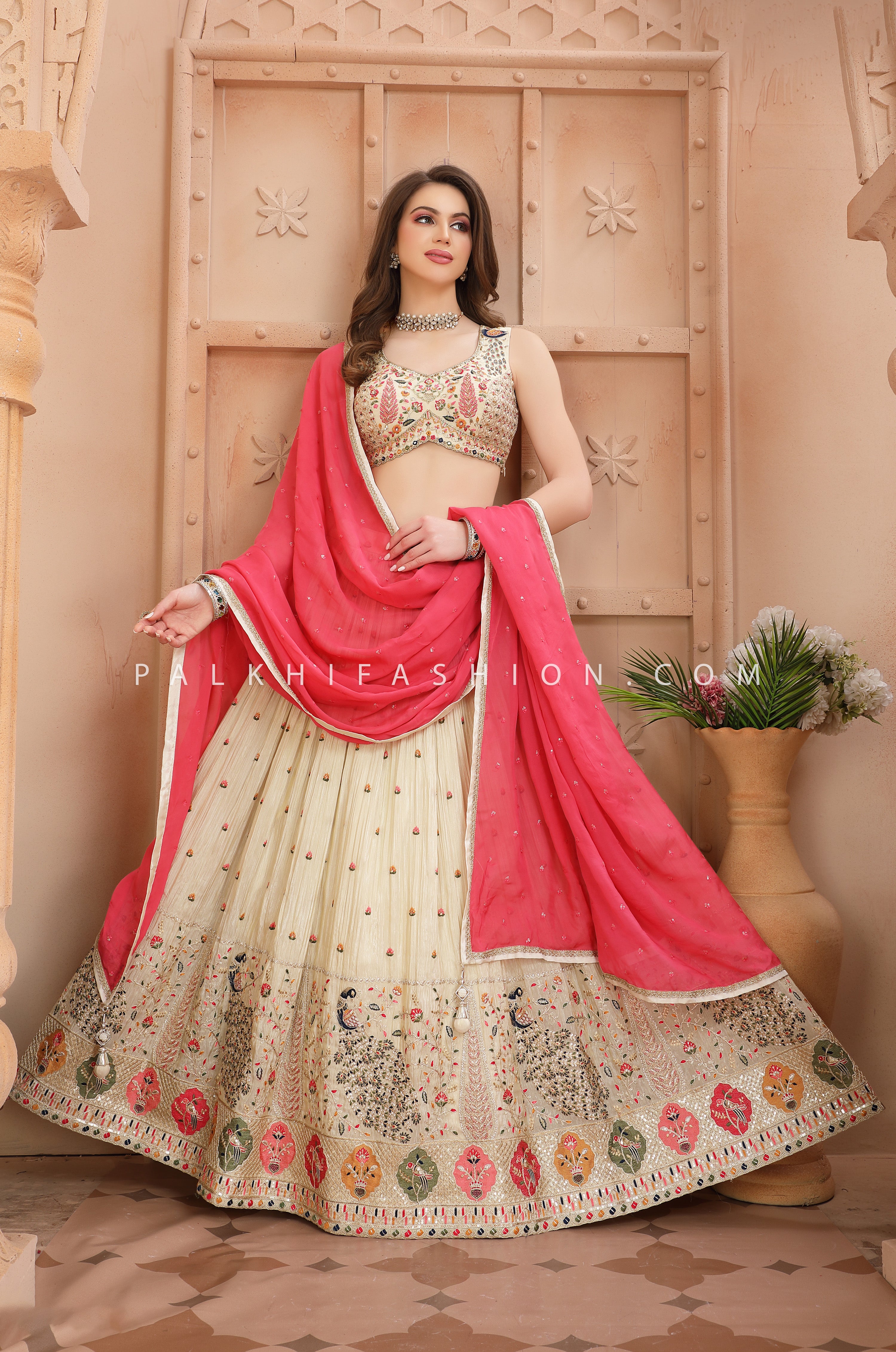 Indian Artistic Work Lehenga Choli in Champagne & Coral 