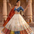 Luxury Ivory Designer Garba Lehenga with Blue Patola Mirror work Blouse | Palkhi Fashion