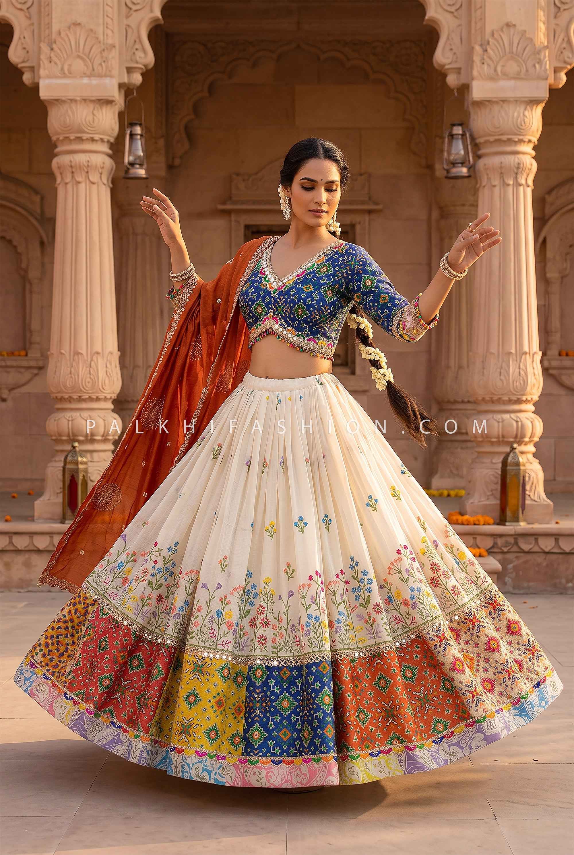 Luxury Ivory Designer Garba Lehenga with Blue Patola Mirror work Blouse | Palkhi Fashion
