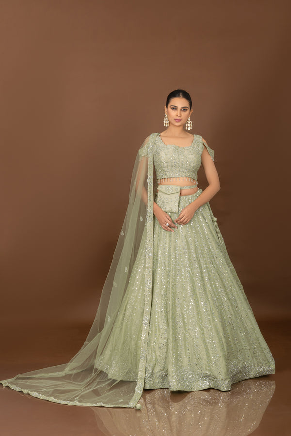 Majestic Allure: Sage Green Designer Lehenga Choli with Mirror Work