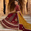 Vibrant Heritage | Maroon Elephant Motif Navratri Chaniya Choli with Mirror Work | Palkhi Fashion