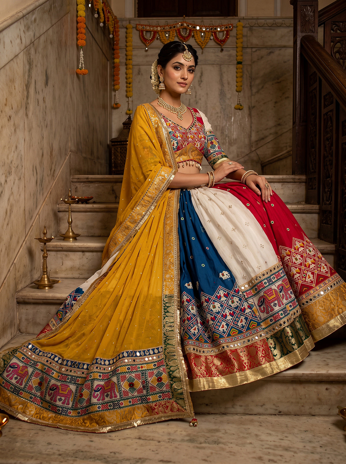 Festive Radiance | Multi-Color Patola Print Navratri Lehenga Choli with Mirror & Embroidery Work | Palkhi Fashion