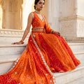 Festive Radiance | Orange & Red Bandhej Chaniya Choli with Mirror Embroidery | Palkhi Fashion