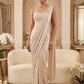 Pearl Luxe – Ivory Champagne Pre Draped Saree with Hand Embellished Corset | Palkhi Fashion