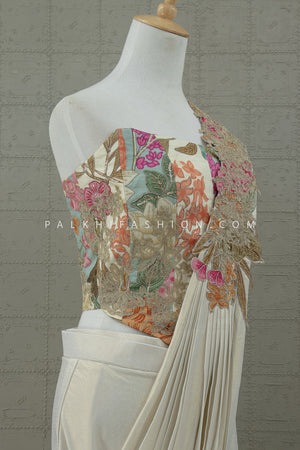 Enchanted Bloom: Ivory Pre - Draped Saree with Floral Embroidered Corset – Palkhi Fashion