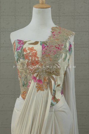 Enchanted Bloom: Ivory Pre - Draped Saree with Floral Embroidered Corset – Palkhi Fashion