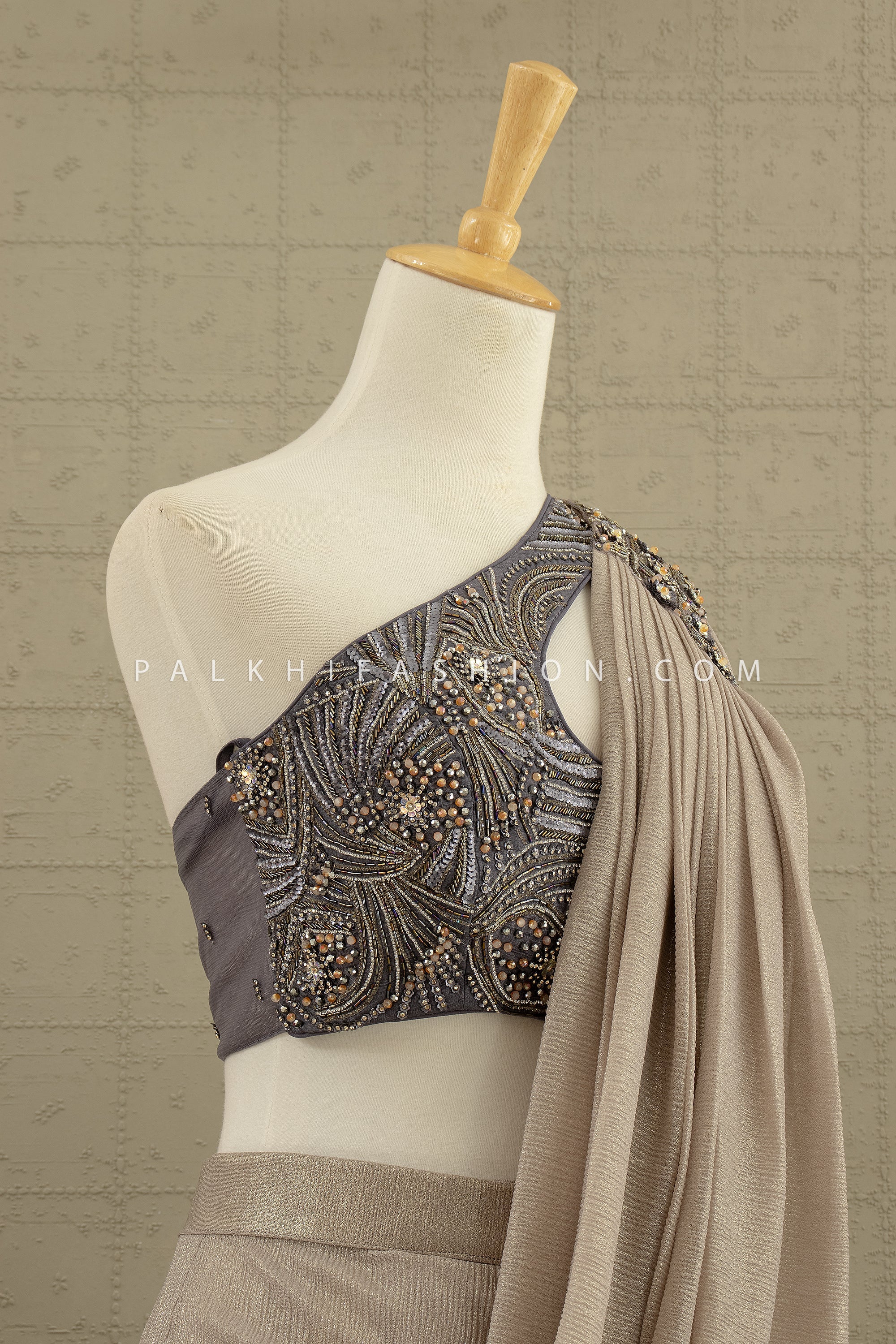 Luxe Mirage: Champagne Sculpted Saree with One - Shoulder Embellished Blouse