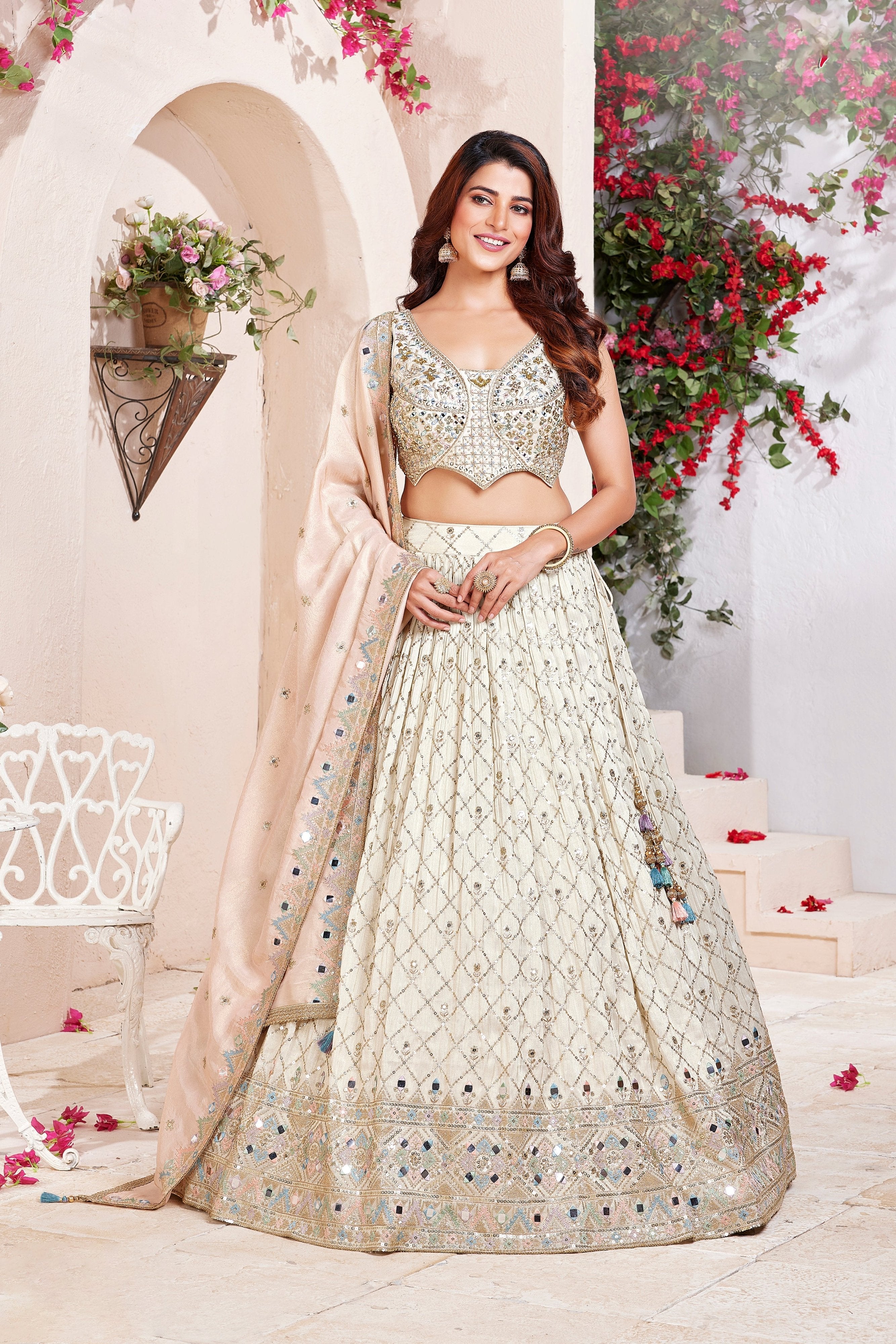 Majestic Grace: Champagne Lehenga Choli with Multicolor Thread and Mirror Work