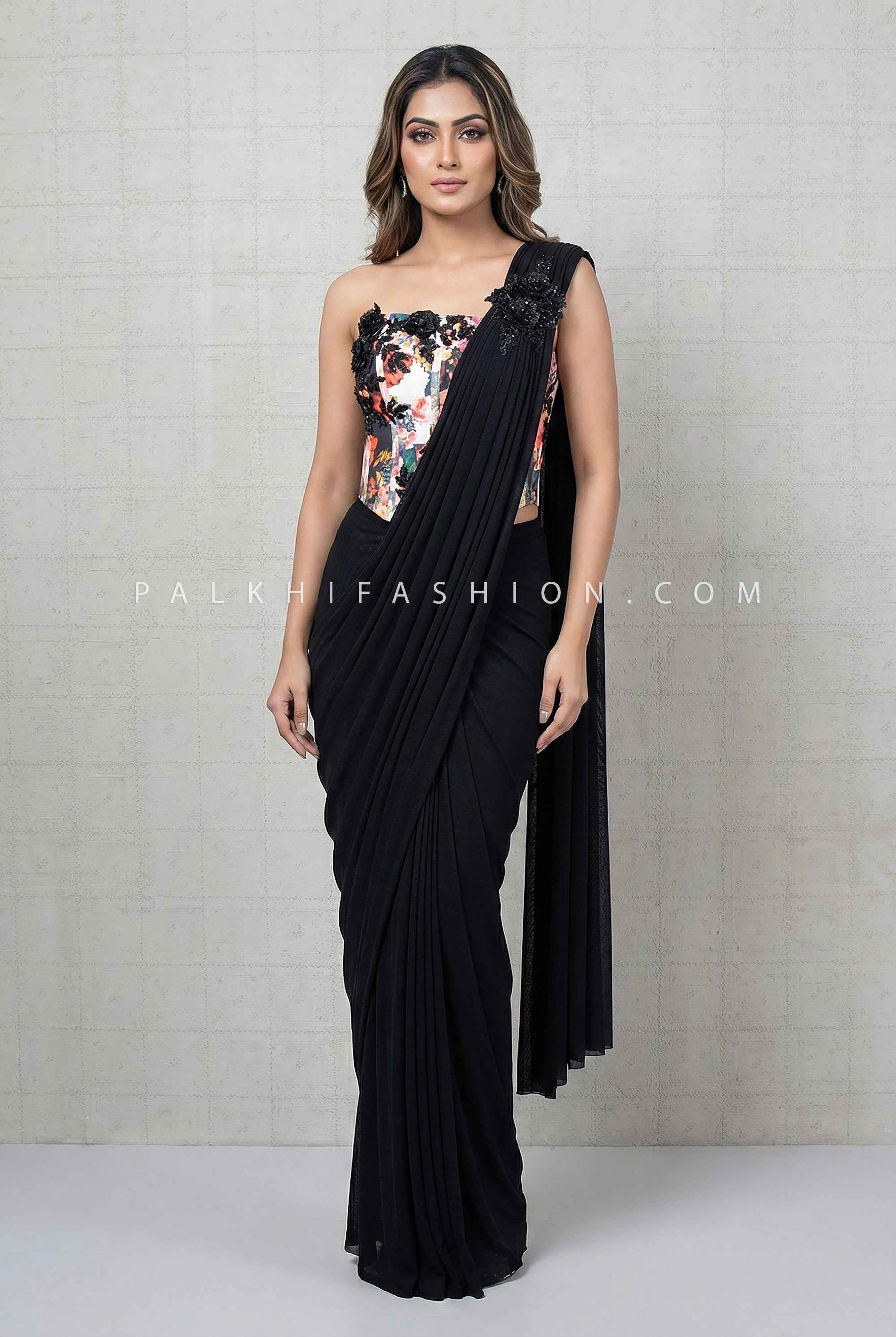 Modern Statement — Black Draped Saree with 3D Floral Corset Top