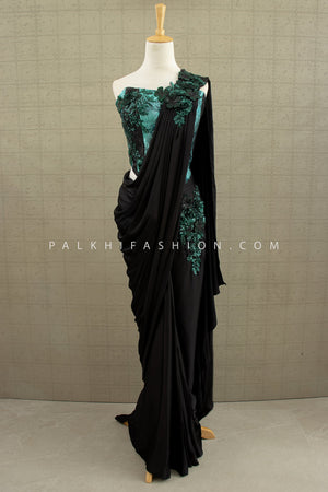 🖤 Noir Enchanté: Black & Teal Sculpted Drape Saree with 3D Floral Embellishments – Palkhi Fashion