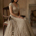 Soft Luxe Radiance – Champagne Designer Lehenga Choli with Mirror, and Hand Embroidery | Palkhi Fashion
