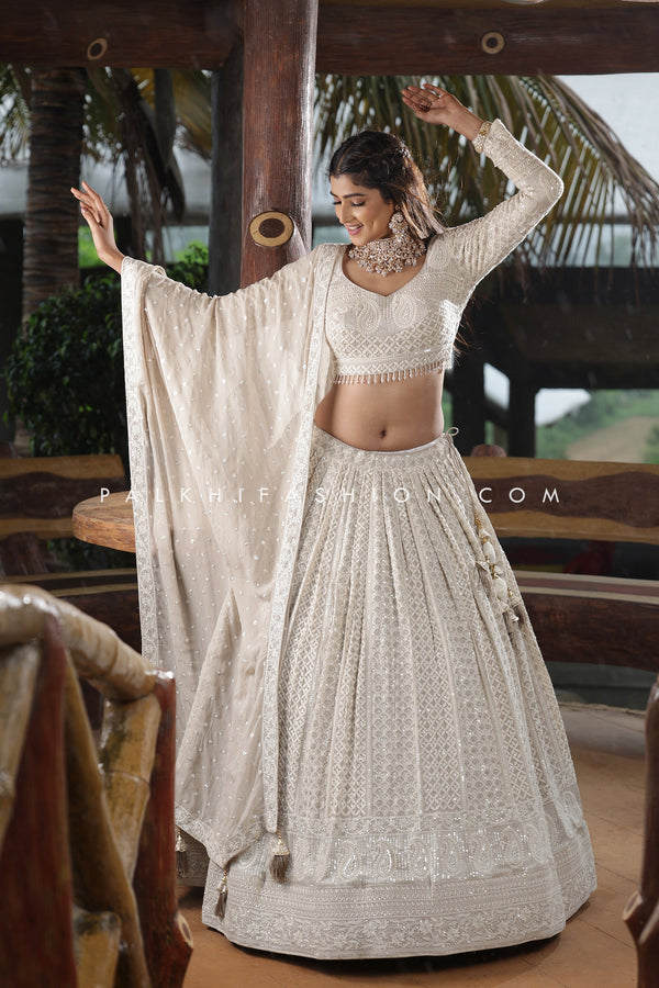 Magnetic Lakhanvi Work Designer Lehenga Choli In Off-white Color - Palkhi Fashion